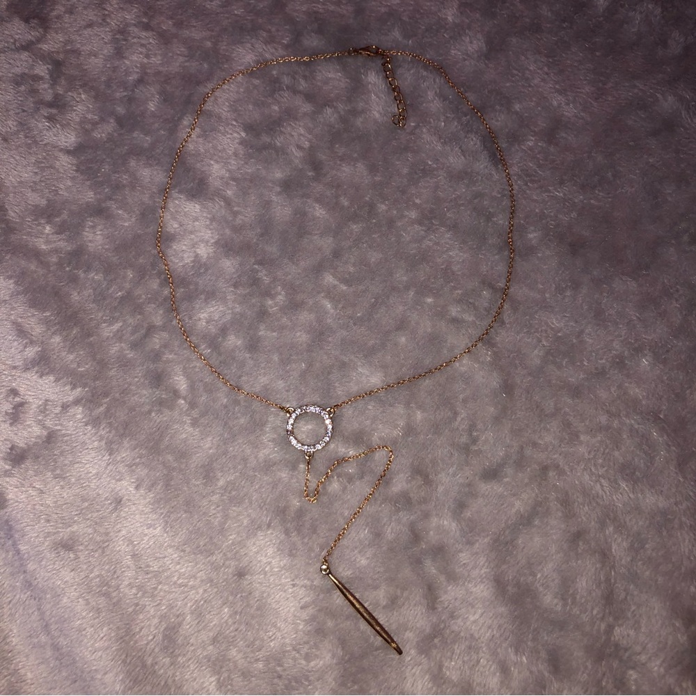 Urban planet necklace with an open hoop crystal detailing